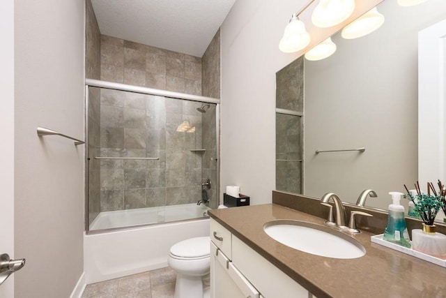 1616 Park Ave, Des Moines, IA 50315 - bathroom with vanity, enclosed tub / shower combo, and a textured ceiling