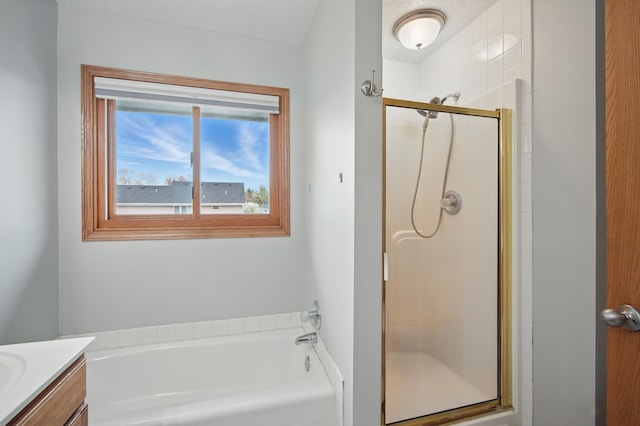 1410 Alderwood Dr, Altoona, IA 50009 - full bathroom with a shower stall, a garden tub, and vanity