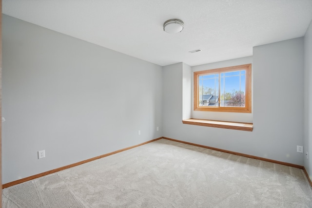 1410 Alderwood Dr, Altoona, IA 50009 - carpeted empty room featuring visible vents and baseboards