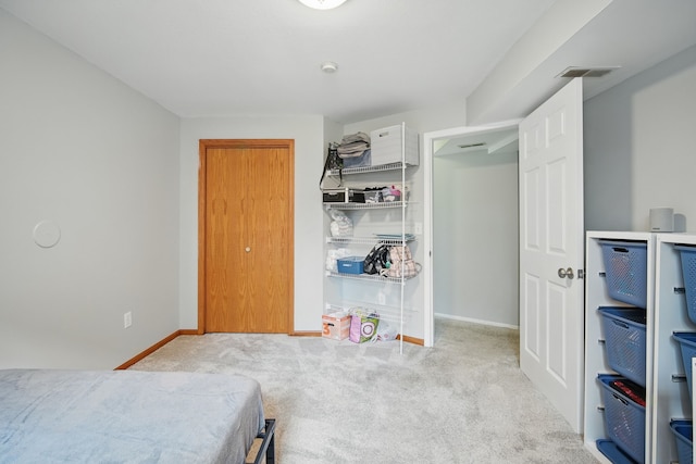 1410 Alderwood Dr, Altoona, IA 50009 - bedroom featuring visible vents, carpet flooring, and baseboards