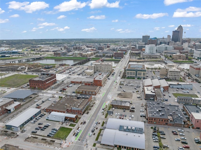 bird's eye view featuring a view of city and a water view