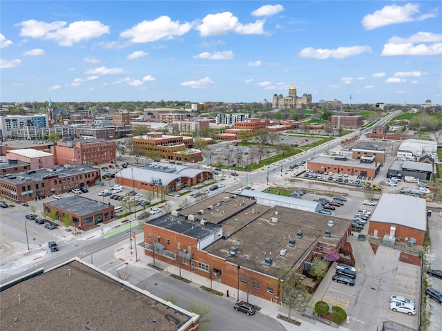 birds eye view of property featuring a city view