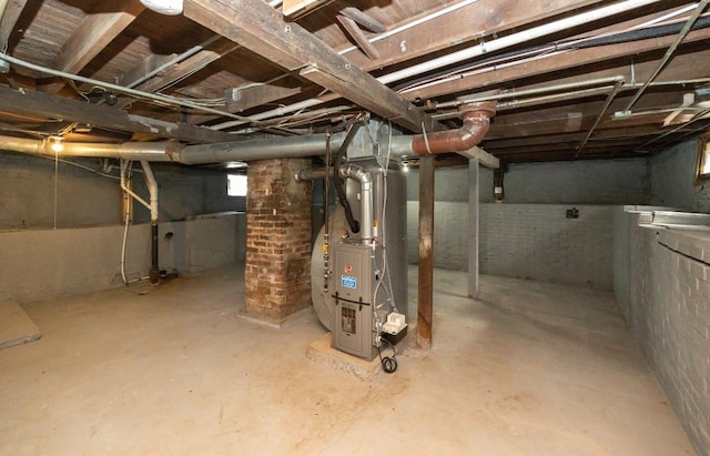 basement featuring heating unit