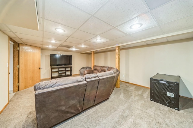 carpeted living area with baseboards, recessed lighting, visible vents, and a drop ceiling