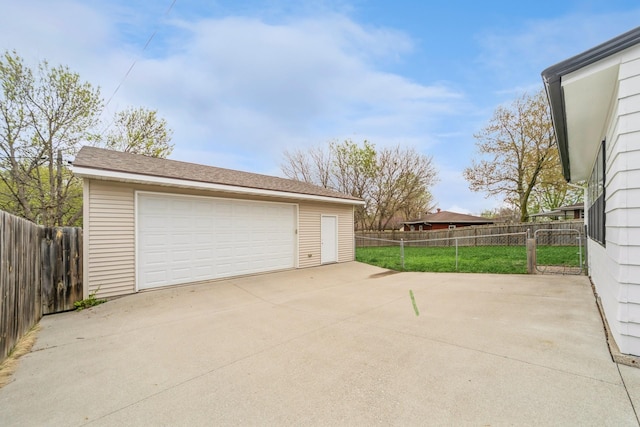 detached garage with fence