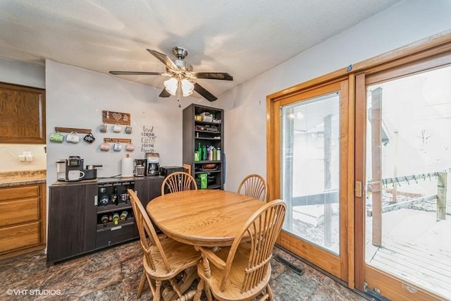 dining area with visible vents and ceiling fan