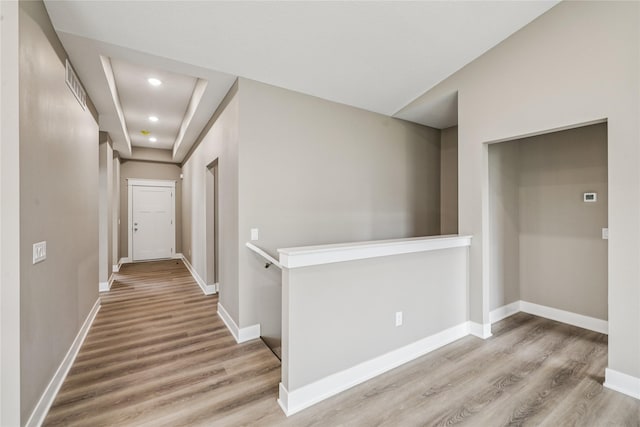 2323 N 8th Ave E, Newton, IA 50208 - hall with wood finished floors, recessed lighting, and an upstairs landing