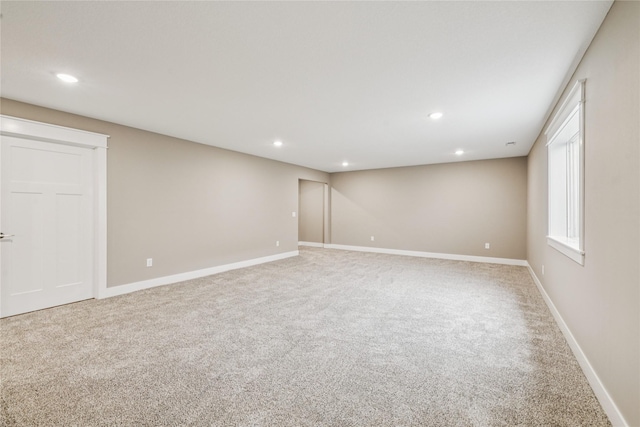 2323 N 8th Ave E, Newton, IA 50208 - unfurnished room featuring carpet and recessed lighting