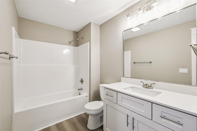 2323 N 8th Ave E, Newton, IA 50208 - bathroom with wood finished floors, vanity, and shower / bath combination