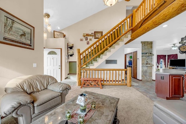 6991 NE 27th Ave, Altoona, IA 50009 - carpeted living area with ceiling fan, stairs, high vaulted ceiling, and recessed lighting