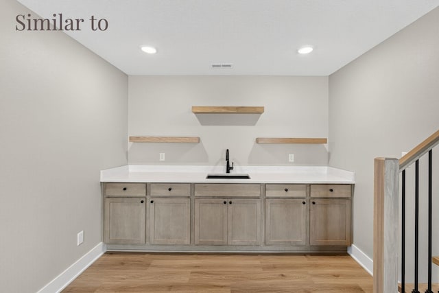 2931 Lake Hill Dr, Des Moines, IA 50320 - bar with light wood finished floors and recessed lighting
