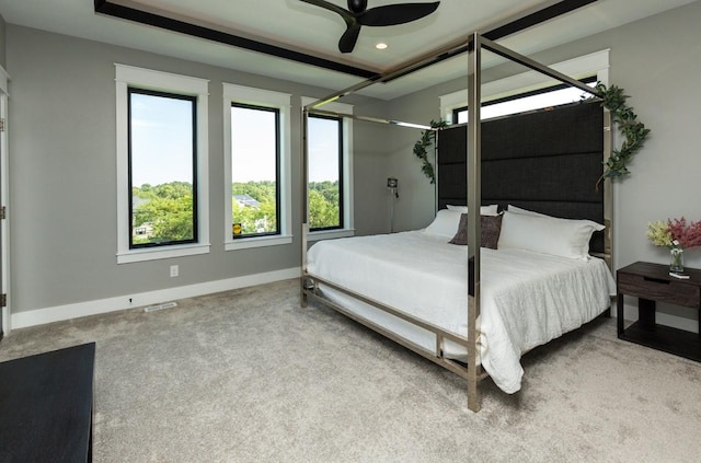 carpeted bedroom featuring visible vents, a ceiling fan, recessed lighting, and baseboards