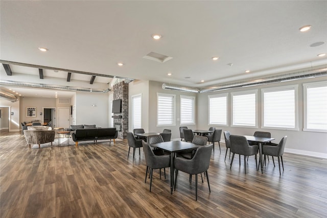 dining room featuring recessed lighting, baseboards, and dark wood-type flooring