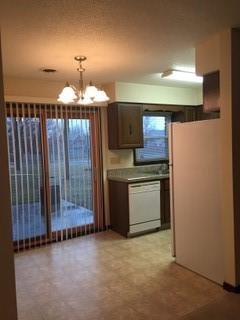 4713 Ontario St, Ames, IA 50014 - kitchen featuring dishwasher, a chandelier, light floors, and hanging light fixtures