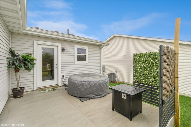 view of patio featuring central AC unit