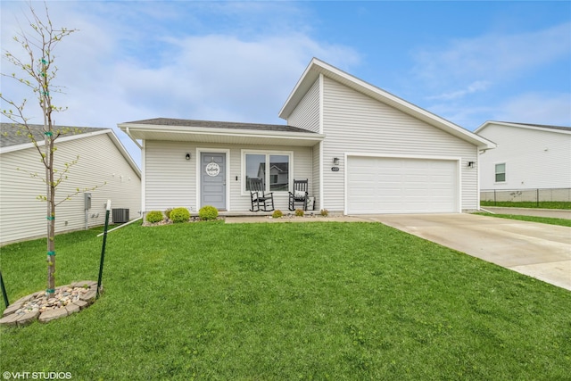 mid-century home with concrete driveway, central AC, a front yard, and an attached garage
