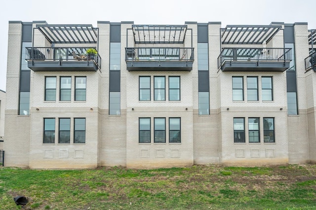 exterior space with brick siding