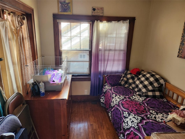 1134 39th St, Des Moines, IA 50311 - bedroom with dark wood-type flooring