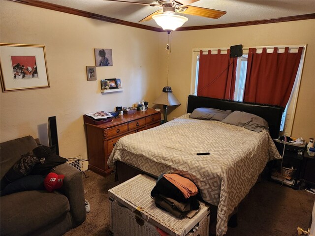 1134 39th St, Des Moines, IA 50311 - bedroom featuring a ceiling fan, crown molding, and carpet flooring