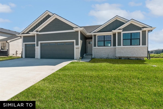 view of front facade featuring board and batten siding, a front yard, concrete driveway, and an attached garage