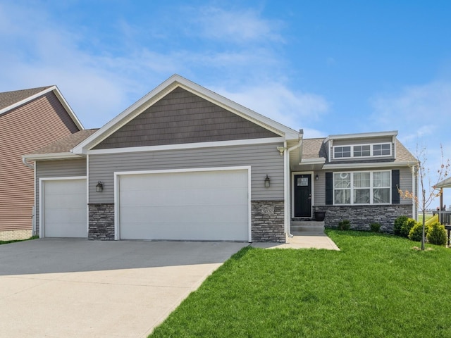 2035 SE Parkview Crossing Dr, Waukee, IA 50263 - craftsman-style home featuring a garage, stone siding, driveway, and a front lawn
