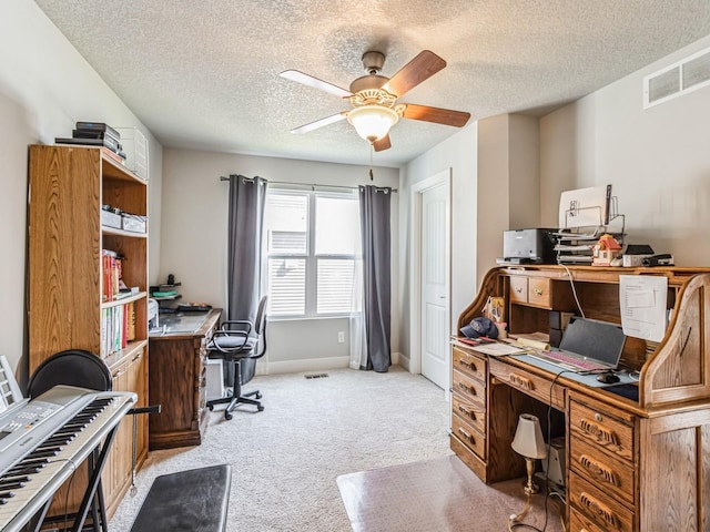2035 SE Parkview Crossing Dr, Waukee, IA 50263 - office space featuring light carpet, a textured ceiling, a ceiling fan, and baseboards