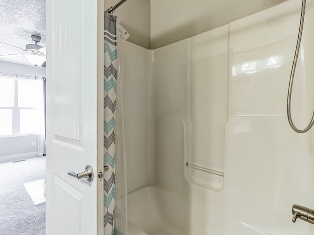 2035 SE Parkview Crossing Dr, Waukee, IA 50263 - full bathroom featuring a textured ceiling and baseboards