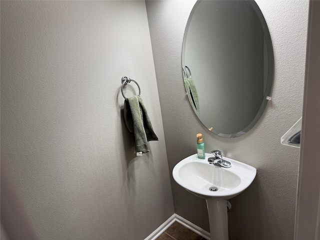 223 SE Booth Ave, Waukee, IA 50263 - bathroom with tile patterned flooring and a sink