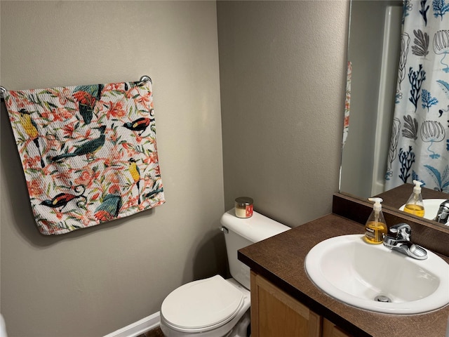 223 SE Booth Ave, Waukee, IA 50263 - bathroom featuring toilet and vanity