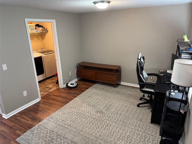 223 SE Booth Ave, Waukee, IA 50263 - office space featuring washing machine and dryer, a textured ceiling, wood finished floors, and baseboards