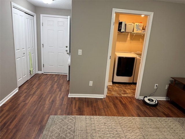 223 SE Booth Ave, Waukee, IA 50263 - interior space featuring washer / dryer, dark wood finished floors, and baseboards