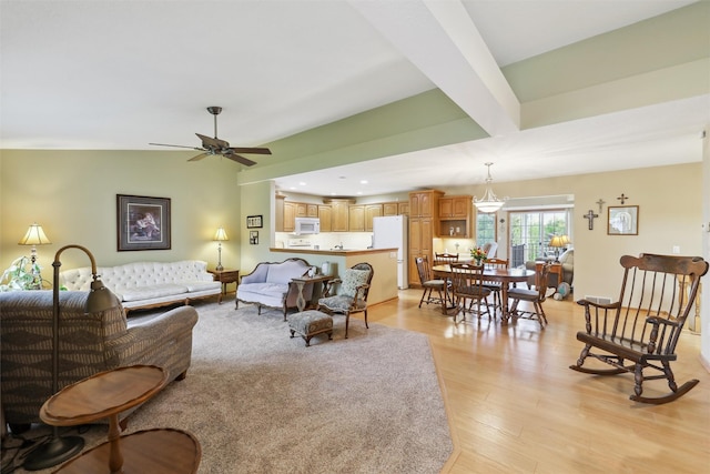 living area featuring recessed lighting, a ceiling fan, and light wood-style flooring
