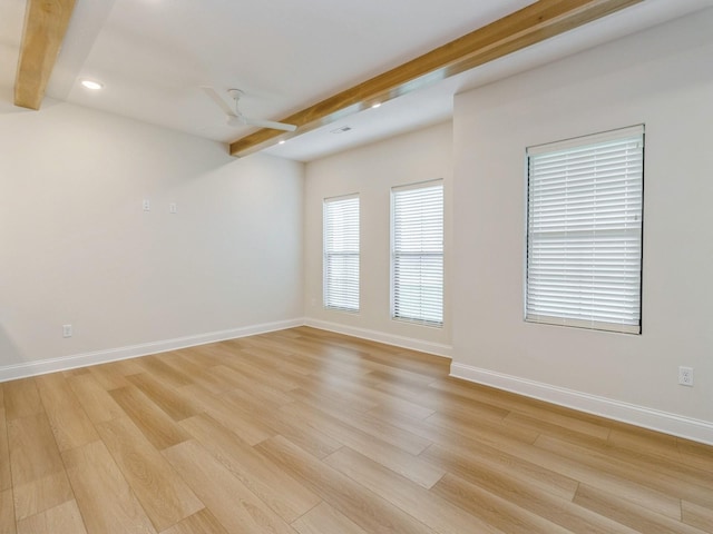 unfurnished room featuring beamed ceiling, light wood finished floors, recessed lighting, and baseboards