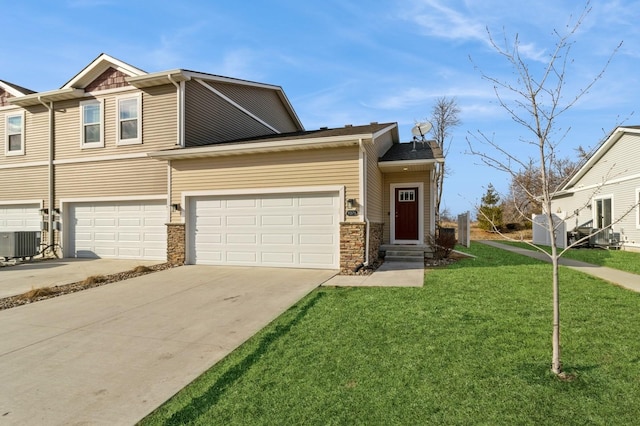 view of property featuring a front lawn, cooling unit, concrete driveway, and stone siding