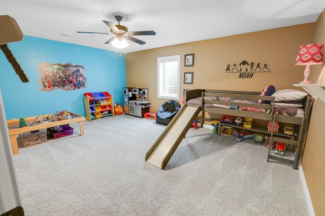 bedroom featuring ceiling fan, baseboards, and carpet floors