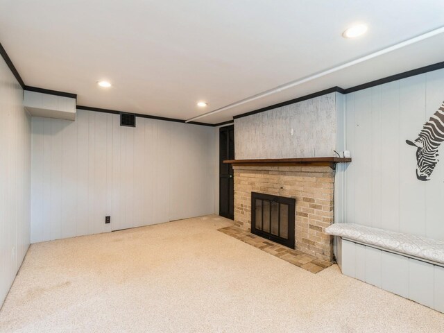 322 49th St, Des Moines, IA 50312 - unfurnished living room featuring carpet floors, a fireplace, and recessed lighting