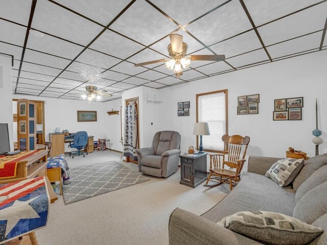 1313 Rose Ave, Des Moines, IA 50315 - living area with a ceiling fan and carpet