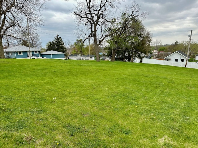 view of yard featuring fence