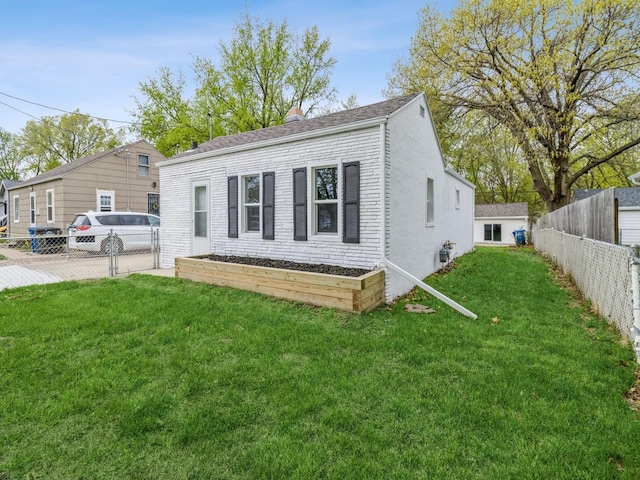 view of front facade featuring fence, a chimney, and a front lawn