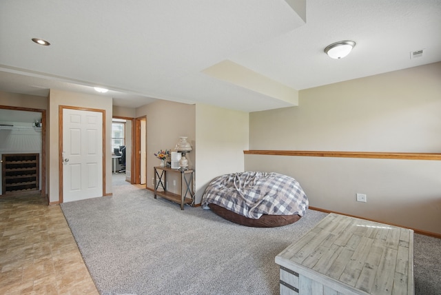sitting room with carpet, recessed lighting, baseboards, wine cooler, and visible vents