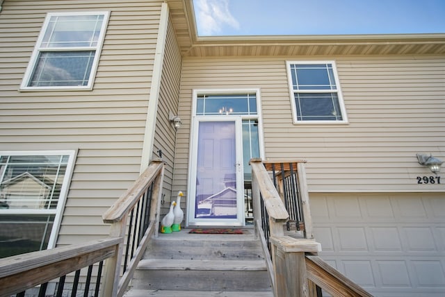 entrance to property with an attached garage