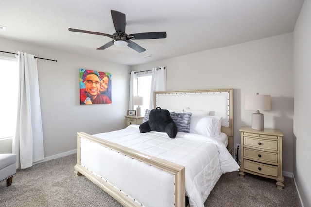 bedroom with baseboards, ceiling fan, and carpet