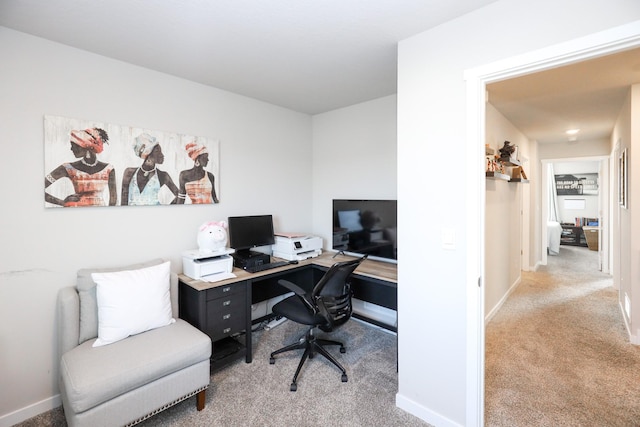 office area with carpet flooring and baseboards