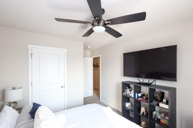 270 NW Charlestown Ln, Waukee, IA 50263 - carpeted bedroom featuring baseboards and ceiling fan