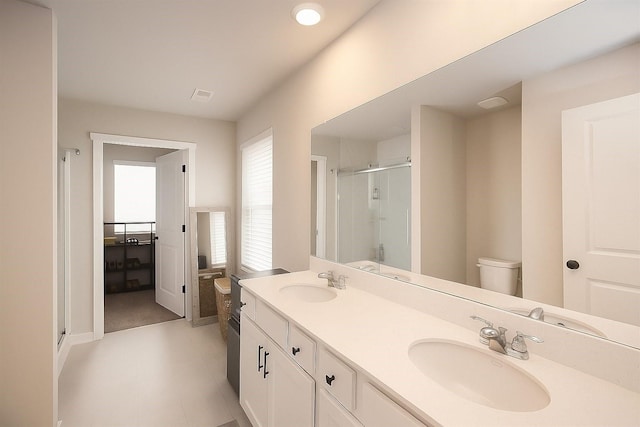 270 NW Charlestown Ln, Waukee, IA 50263 - bathroom with a stall shower and double vanity