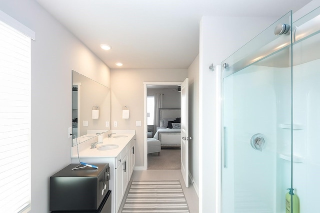 270 NW Charlestown Ln, Waukee, IA 50263 - bathroom featuring ensuite bath, double vanity, a shower with door, and recessed lighting