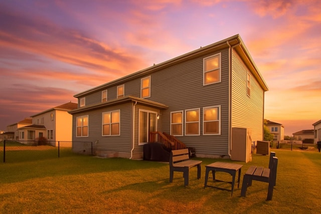 270 NW Charlestown Ln, Waukee, IA 50263 - back of property at dusk featuring a fenced backyard