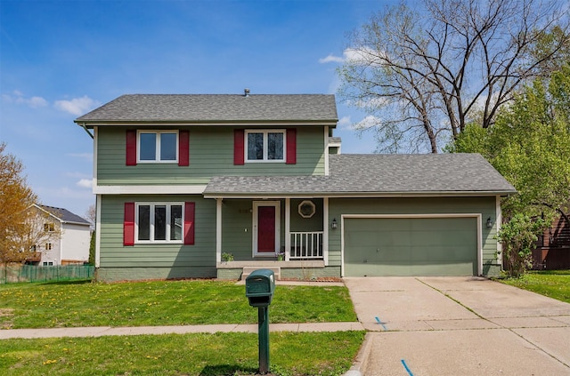 traditional-style house with fence, an attached garage, a porch, a front yard, and driveway