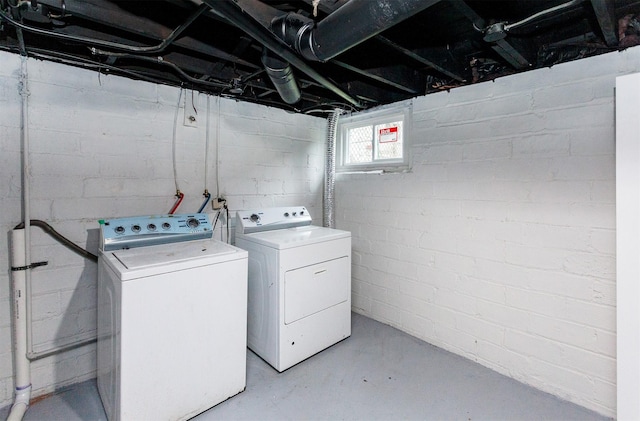 laundry area featuring laundry area and washer and clothes dryer