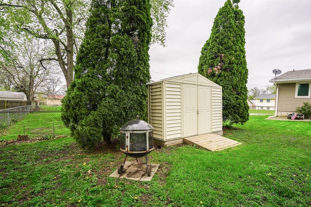 view of shed with fence